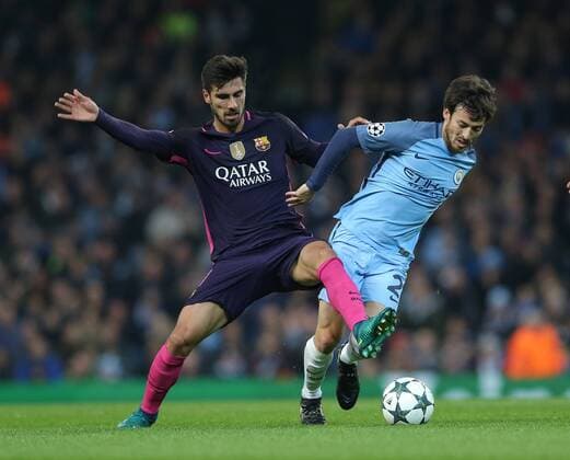 Andre Gomes of Barcelona tussles with David Silva of Manchester City during the Champions League Group C match at the Etihad Stadium, Manchester. Picture date: November 1st, 2016. Pic Simon Bellis Sportimage EDITORIAL USE ONLY. No use with unauthorised audio, video, data, fixture lists, club league logos or live services. Online in-match use limited to 120 images, no video emulation. No use in betting, games or single club league player publications.