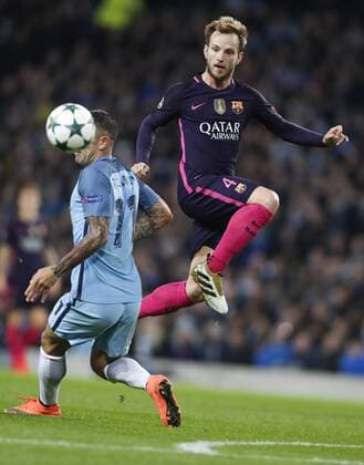 (161102) -- MANCHESTER, Nov. 2, 2016 -- Ivan Rakitic (R) of Barcelona vies for the ball during the UEFA Champions League Group C match between Manchester City and Barcelona at Etihad Stadium in Manchester, Britain, on Nov. 1, 2016. Manchester City won 3-1. ) (SP)BRITAIN-MANCHESTER-SOCCER-UEFA CHAMPIONS LEAGUE-MAN CITY VS BARCELONA HanxYan 