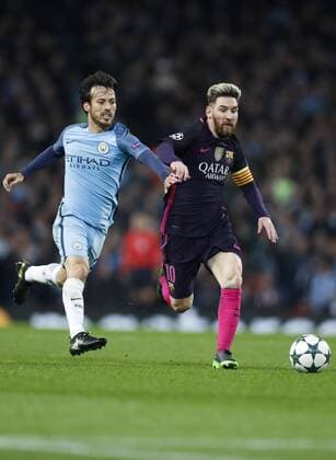 (161102) -- MANCHESTER, Nov. 2, 2016 -- Lionel Messi (R) of Barcelona vies for the ball with David Silva of Manchester City during their UEFA Champions League Group C match at Etihad Stadium in Manchester, Britain, on Nov. 1, 2016. Manchester City won 3-1. ) (SP)BRITAIN-MANCHESTER-SOCCER-UEFA CHAMPIONS LEAGUE-MAN CITY VS BARCELONA HanxYan 