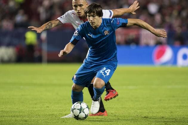 November 2, 2016 - Seville, Spain - Ante Coric of Dinamo Zagreb vies for the ball with Kranevitter of Sevilla during the UEFA Champions League Group H soccer match between Sevilla FC and GNK Dinamo Zagreb at Estadio Ramon Sanchez Pizjuan Soccer 2016 - Sevilla FC vs GNK Dinamo Zagreb - ZUMAa142 20161102_zap_a142_004