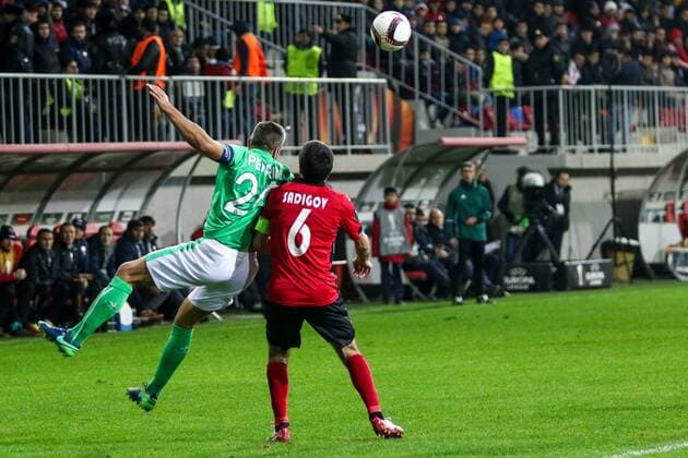 Azerbaijan: Europa League: FC Qabala - Saint Etienne Gabala FK Rashad A. Sadygov (R) vies for the ball with Saint Etienne s Loic Perrin (L) during the Europa League match between FC Qabala and Saint Etienne at 8km stadiumin Baku.  AzizxKarimov PacificxPress