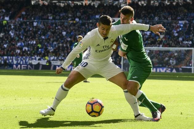 Real Madrid s player James Rodriguez and Leganes s player Gabriel Appelt Pires during a match of La Liga at Santiago Bernabeu Stadium in Madrid. November 06, Spain. 2016.  (20161106115)