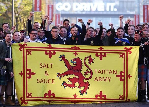 11.11.2016. Wembley Stadium, London, England. World Cup Qualifying Football. England versus Scotland. Scotland fans pose with a flag, as they make the walk down Wembley Way xMarkxKertonx  ActionPlus11808378