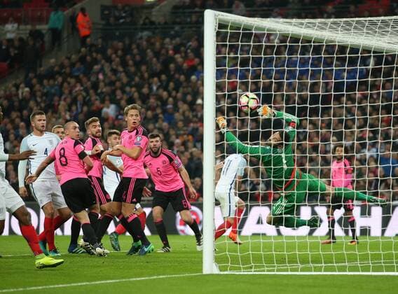 Gary Cahill of England scores the third goal past Craig Gordon of Scotland during the FIFA World Cup WM Weltmeisterschaft Fussball Qualifying Group F match at Wembley Stadium, London. Picture date: November 11th, 2016. Pic David Klein Sportimage EDITORIAL USE ONLY. No use with unauthorised audio, video, data, fixture lists, club league logos or live services. Online in-match use limited to 120 images, no video emulation. No use in betting, games or single club league player publications.