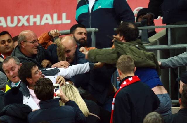 England v Scotland - FIFA World Cup WM Weltmeisterschaft Fussball 2018 Qualifier . . London, UK . . 11.11.2016 Fighting broke out amongst some England supporters, leaving one man covered in blood. 