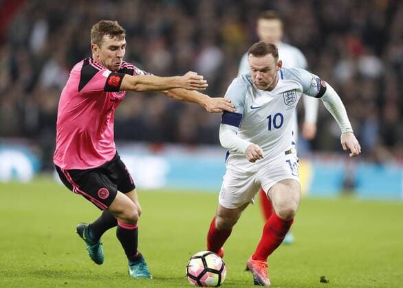 LONDON, Nov. 11, 2016 -- Wayne Rooney (R) of England vies with Darren Fletcher of Scotland during the Group F match between England and Scotland at 2018 FIFA World Cup WM Weltmeisterschaft Fussball European Qualifiers at Wembley Stadium in London, England on Nov. 11, 2016. England won 3-0. ) (SP)BRITAIN-LONDON-FOOTBALL-FIFA WORLD CUP QUALIFIER-ENGLAND VS SCOTLAND HanxYan 