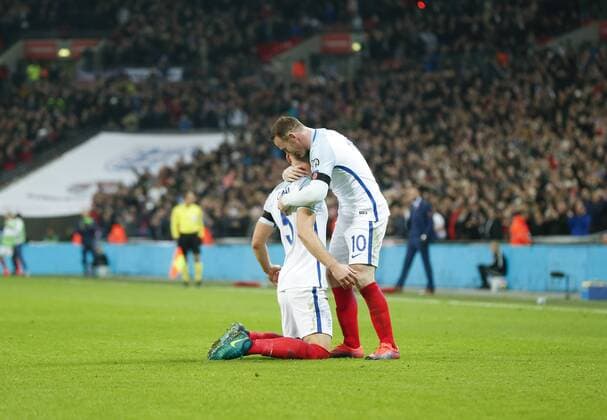LONDON, Nov. 11, 2016 -- Wayne Rooney (R) of England celebrates Gary Cahill s goal during the Group F match between England and Scotland at 2018 FIFA World Cup WM Weltmeisterschaft Fussball European Qualifiers at Wembley Stadium in London, England on Nov. 11, 2016. England won 3-0. ) (SP)BRITAIN-LONDON-FOOTBALL-FIFA WORLD CUP QUALIFIER-ENGLAND VS SCOTLAND HanxYan 
