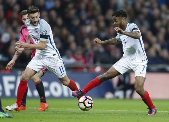 LONDON, Nov. 11, 2016 -- Raheem Sterling (R) of England controls the ball during the Group F match between England and Scotland at 2018 FIFA World Cup WM Weltmeisterschaft Fussball European Qualifiers at Wembley Stadium in London, England on Nov. 11, 2016. England won 3-0. ) (SP)BRITAIN-LONDON-FOOTBALL-FIFA WORLD CUP QUALIFIER-ENGLAND VS SCOTLAND HanxYan 