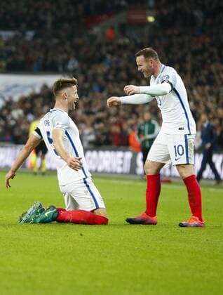 LONDON, Nov. 11, 2016 -- Wayne Rooney (R) of England celebrates Gary Cahill s goal during the Group F match between England and Scotland at 2018 FIFA World Cup WM Weltmeisterschaft Fussball European Qualifiers at Wembley Stadium in London, England on Nov. 11, 2016. England won 3-0. ) (SP)BRITAIN-LONDON-FOOTBALL-FIFA WORLD CUP QUALIFIER-ENGLAND VS SCOTLAND HanxYan 