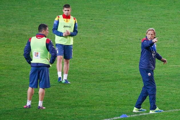 GROZNY, RUSSIA - NOVEMBER 14, 2016: Romanian national football team head coach Christoph Daum (R) during a training session at the Akhmat Arena on the eve of the friendly match against Russia. Valery Matytsin TASS  TS037943