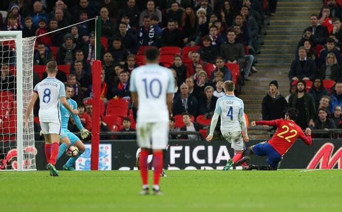 England s Tom Heaton gets beaten by Spain s Isco for their second goal during the friendly match at Wembley Stadium, London. Picture date November 15th, 2016 Pic David Klein Sportimage EDITORIAL USE ONLY. No use with unauthorised audio, video, data, fixture lists, club league logos or live services. Online in-match use limited to 120 images, no video emulation. No use in betting, games or single club league player publications.