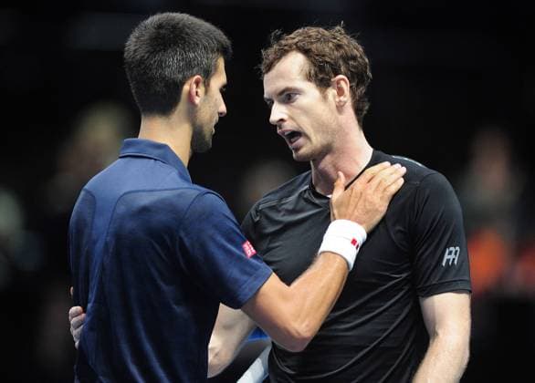 Tennis - 2016 ATP Tennis Herren World Tour Finals at The O2 - Day Eight Singles Final: Andy Murray (Great Britain) vs. Novak Djokovic (Serbia) Novak Djokovic congratulates Andy Murray at the net after winning the match and finishing no.1 in the Rankings COLORSPORT ANDREW COWIE 