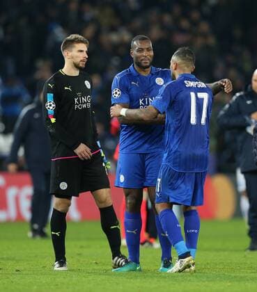 Leicester s Danny Simpson and Wes Morgan celebrate at the final whistle during the Champions League group B match at the King Power Stadium, Leicester. Picture date November 22nd, 2016 Pic David Klein Sportimage EDITORIAL USE ONLY. No use with unauthorised audio, video, data, fixture lists, club league logos or live services. Online in-match use limited to 120 images, no video emulation. No use in betting, games or single club league player publications.
