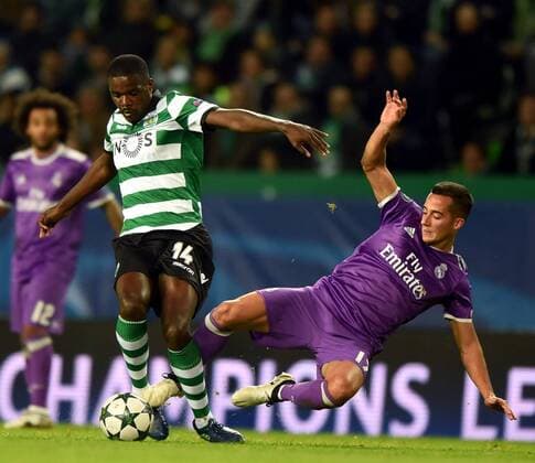 LISBON, Nov. 22, 2016 -- Real Madrid s Lucas Vazquez(R) vies with Sporting CP s William Carvalho during the UEFA Champions League Group F soccer match between Sporting CP and Real Madrid CF at Alvalade stadium in Lisbon, Portugal, Nov. 22, 2016. Real Madrid won 2-1. )(wll) (SP)PORTUGAL-LISBON-SOCCER-UEFA CHAMPIONS LEAGUE-SPORTING CP VS REAL MADRID ZhangxLiyun 