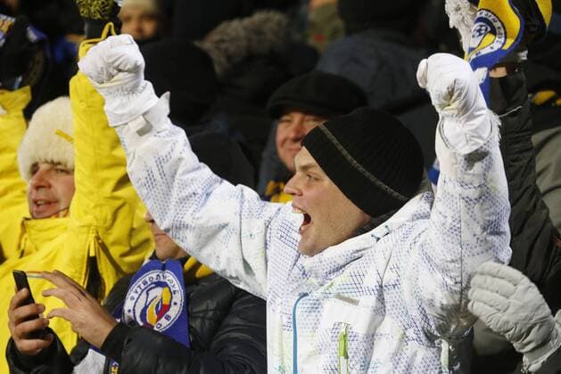 ROSTOV-ON-DON, RUSSIA - NOVEMBER 23, 2016: FC Rostov s fans cheering in the stands at their 2016 17 UEFA Champions League Group D Round 5 football match against FC Bayern Munich at the Olimp-2 Stadium. Rostov won the game 3-2. Valery Matytsin TASS  TS0389CC