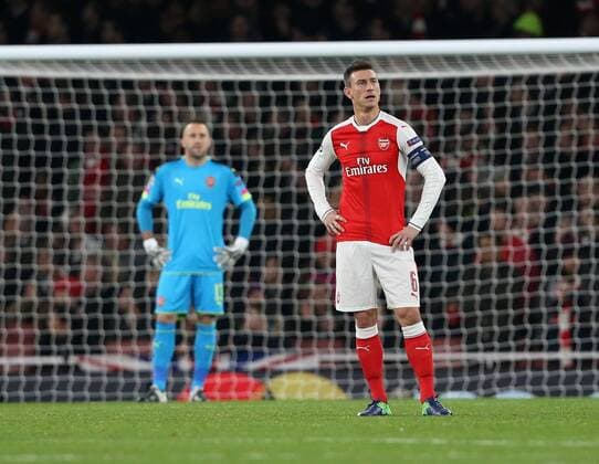 Arsenal s Laurent Koscielny looks on dejected after PSG s opening goal during the Champions League group A match at the Emirates Stadium, London. Picture date November 23rd, 2016 Pic David Klein Sportimage EDITORIAL USE ONLY. No use with unauthorised audio, video, data, fixture lists, club league logos or live services. Online in-match use limited to 120 images, no video emulation. No use in betting, games or single club league player publications.