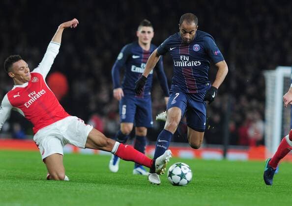 Football - 2016 2017 UEFA Champions League - Group A: Arsenal vs. Paris Saint-Germain Lucas of PSG and Kieran Gibbs of Arsenal at The Emirates. COLORSPORT ANDREW COWIE 