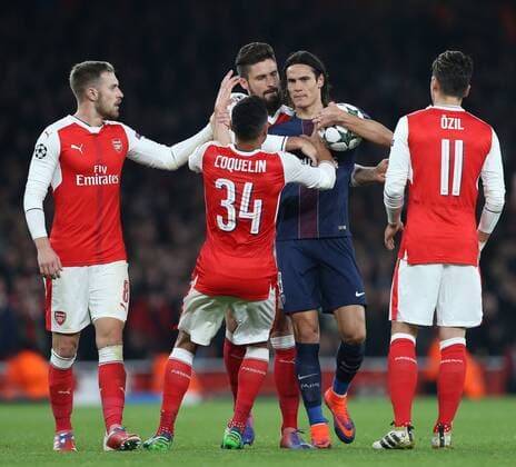 PSG s Edinson Cavani catches ArsenalâÄ?s Aaron Ramsey during the Champions League group A match at the Emirates Stadium, London. Picture date November 23rd, 2016 Pic David Klein Sportimage EDITORIAL USE ONLY. No use with unauthorised audio, video, data, fixture lists, club league logos or live services. Online in-match use limited to 120 images, no video emulation. No use in betting, games or single club league player publications.