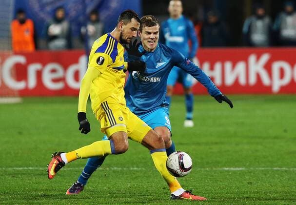 ST PETERSBURG, RUSSIA â€“ NOVEMBER 24, 2016: Maccabi Tel-Avivâ€™s Yegor (Egor) Filipenko (front) and Zenit St Petersburgâ€™s Alexander Kokorin in their 2016 2017 UEFA Europa League Round 5 Group D football match at Petrovsky Stadium. Zenit St Petersburg won 2-0. Peter Kovalev TASS  TS038C17