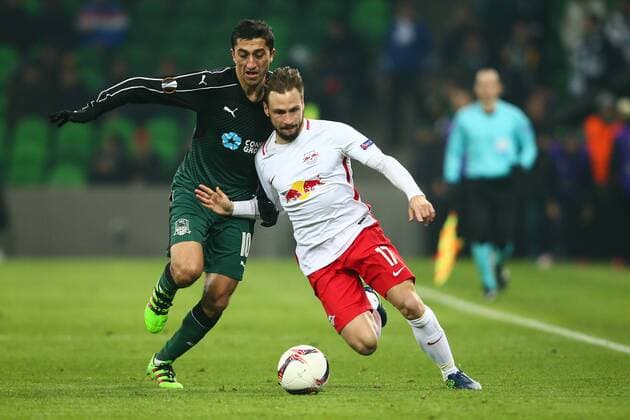 SOCCER - EL, Krasnodar vs RBS KRASNODAR,RUSSIA,24.NOV.16 - SOCCER - UEFA Europa League, group stage, FK Krasnodar vs Red Bull Salzburg. Image shows Odil Akhmedov (Krasnodar) and Andreas Ulmer (RBS). GEPAxpictures xFelixxRoittner