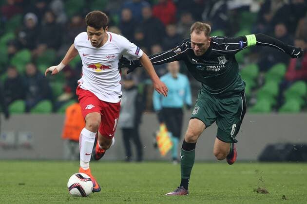 SOCCER - EL, Krasnodar vs RBS KRASNODAR,RUSSIA,24.NOV.16 - SOCCER - UEFA Europa League, group stage, FK Krasnodar vs Red Bull Salzburg. Image shows Hee Chan Hwang (RBS) and Andreas Granqvist (Krasnodar). GEPAxpictures xMathiasxMandl