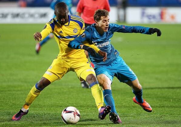 ST PETERSBURG, RUSSIA â€“ NOVEMBER 24, 2016: Maccabi Tel-Avivâ€™s Elazar Eli Dasa (L) and Zenit St Petersburgâ€™s Luka Dordevic in their 2016 2017 UEFA Europa League Round 5 Group D football match at Petrovsky Stadium. Zenit St Petersburg won 2-0. Peter Kovalev TASS  TS038BB4