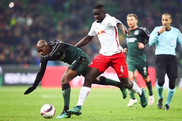SOCCER - EL, Krasnodar vs RBS KRASNODAR,RUSSIA,24.NOV.16 - SOCCER - UEFA Europa League, group stage, FK Krasnodar vs Red Bull Salzburg. Image shows Dayot Upamecano (RBS) and Charles Kabore (Krasnodar). GEPAxpictures xFelixxRoittner