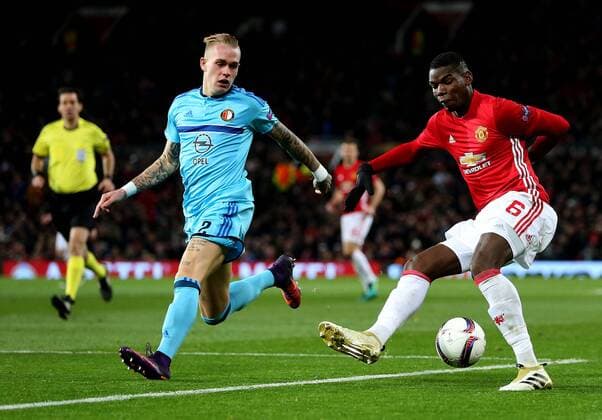 Paul Pogba of Manchester United ManU takes on Rick Karsdorp of Feyenoord during the UEFA Europa League match at Old Trafford, Manchester. Picture date: November 24th 2016. Pic Matt McNulty Sportimage EDITORIAL USE ONLY. No use with unauthorised audio, video, data, fixture lists, club league logos or live services. Online in-match use limited to 120 images, no video emulation. No use in betting, games or single club league player publications.