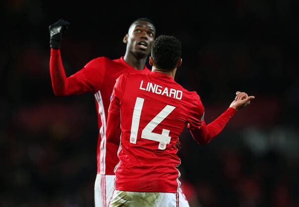 Jesse Lingard of Manchester United ManU dances with Paul Pogba in celebration after scoring his sides fourth goal during the UEFA Europa League match at Old Trafford, Manchester. Picture date: November 24th 2016. Pic Matt McNulty Sportimage EDITORIAL USE ONLY. No use with unauthorised audio, video, data, fixture lists, club league logos or live services. Online in-match use limited to 120 images, no video emulation. No use in betting, games or single club league player publications.