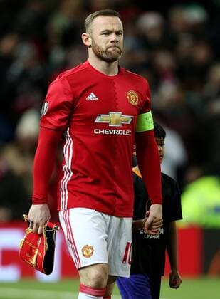 Wayne Rooney of Manchester United ManU walks out with a mascot during the UEFA Europa League match at Old Trafford, Manchester. Picture date: November 24th 2016. Pic Matt McNulty Sportimage EDITORIAL USE ONLY. No use with unauthorised audio, video, data, fixture lists, club league logos or live services. Online in-match use limited to 120 images, no video emulation. No use in betting, games or single club league player publications.