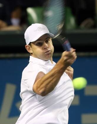 November 26, 2016, Tokyo, Japan - Former world number one ranker Andy Roddick of the United States returns the ball against Japan s Kei Nishikori during an annual charity tennis match Dream Tennis Ariake in Tokyo on Saturday, November 26, 2016. Admission money will be donated for the rebuild of tennis facilities at the tsunami affected area in northern Japan. NOxTHIRDxPARTYxSALES.  (lwxa006505)