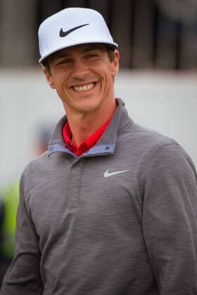 MELBOURNE, VIC - NOVEMBER 27: Thorbjorn smiles as he heads out to the 18th green to receive the trophy for winning the SPS HANDA World Cup of Golf on the final day of the ISPS HANDA World Cup of Golf on November 27, 2016, at Kingston Heath Golf Club in Melbourne, Australia. (Photo by Jason Heidrich Icon Sportswire) GOLF: NOV 27 World Cup of Golf - Final Round Icon161127102 EDITORIAL USE ONLY