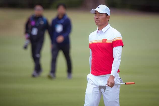 MELBOURNE, VIC - NOVEMBER 27: Ashun Wo of China walks towards his ball on the final day of the ISPS HANDA World Cup of Golf on November 27, 2016, at Kingston Heath Golf Club in Melbourne, Australia. (Photo by Jason Heidrich Icon Sportswire) GOLF: NOV 27 World Cup of Golf - Final Round Icon161127088 EDITORIAL USE ONLY