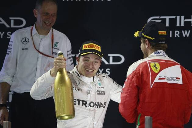 Abu Dhabi Grand Prix, UAE 24 - 27 November 2016 27.11.2016 - Race, 2nd place Nico Rosberg (GER) Mercedes AMG F1 W07 Hybrid and Champion 2016 and 3rd place Sebastian Vettel (GER) Scuderia Ferrari SF16-H 