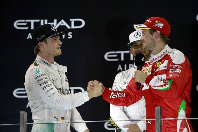 Abu Dhabi Grand Prix, UAE 24 - 27 November 2016 27.11.2016 - Race, 2nd place Nico Rosberg (GER) Mercedes AMG F1 W07 Hybrid and Champion 2016 and 3rd place Sebastian Vettel (GER) Scuderia Ferrari SF16-H 