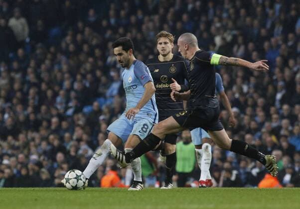 06.12.2016. Manchester, England. UEFA Champions League football, group stages. Manchester City versus Glasgow Celtic. Celtic skipper Scott Brown challenges Manchester City midfielder Ilkay Gundogan. xAlanxMartinx  ActionPlus11817639