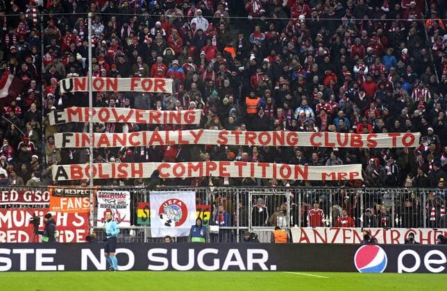 06.12.2016, Fussball Champions-League 2016 2017, Vorrunde 6.Spieltag, FC Bayern München - Atletico Madrid, in der Allianzarena München. âÄžUnion for empowering financially strong clubs to abolish competitionâÄœ (Auf deutsch: âÄžUnion zur Stärkung der finanzstarken Vereine zur Abschaffung des WettbewerbsâÄœ) steht auf dem Banner der Bayern-Ultras gegen die UEFA Reform der Championsleague, wonach die Lücke zwischen Arm und Reich noch größer werden wird. 