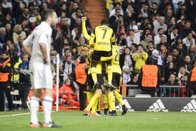Real Madrid s Daniel Carvajal and Borussia Dortmund Ousmane Dembele and Lukasz Pisczek during the UEFA Champions League match between Real Madrid and Borussia Dortmund at Santiago Bernabeu Stadium in Madrid, Spain. December 07, 2016.  (20161207053)