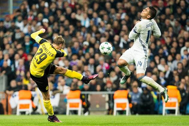 Borussia Dortmund Marcel Shmeizer, Real Madrid s Carlos Henrique Casemiro during Champions League match between Real Madrid and Borussia Dortmund at Santiago Bernabeu Stadium in Madrid , Spain. December 07, 2016.  (20161207031)