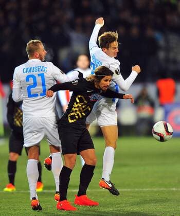 Osmanlispor s Tiago Pinto between Zurich s Dzengis Cavusevic and Cedric Brunner during UEFA European League, group L soccer match, between Osmanlispor and Zurich at Osmanli Stadyumu in Ankara, 12th of December, 2016. (  Copyright: HikmetxSaatci 15577839