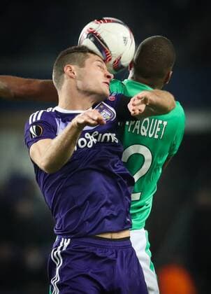 Anderlecht s Uros Spajic and Saint-Etienne s Kevin Monnet-Paquet fight for the ball during the sixth and last game in the group stage (group C) of the UEFA Europa League competition between Belgian soccer club RSC Anderlecht and French club AS Saint-Etienne, in Brussels, Thursday 08 December 2016. Anderlecht is already qualified for the next stage. VIRGINIExLEFOUR  x04993911x
