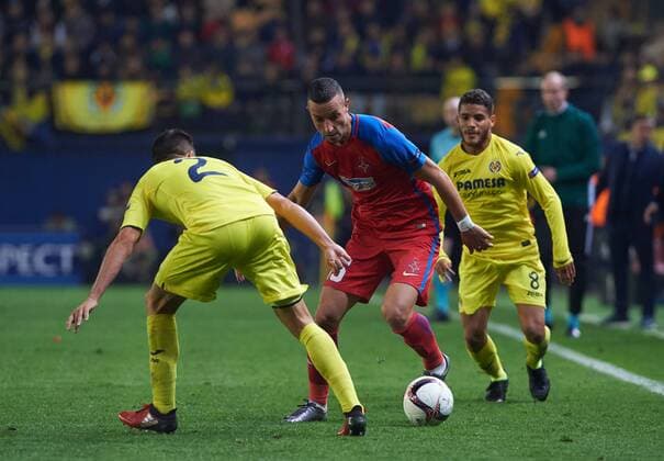 December 8, 2016 - Vila-Real, Castellon, Spain - Mario Gaspar of Villarreal CF and Marko Momcilovic of FC Steaua Bucuresti during the UEFA Europa League group L football match beetween Villarreal CF and Steaua Bucuresti at Estadio El Madrigal, in Vila-real, Spain on December 8, 2016. Villarreal CF v FC Steaua Bucuresti - UEFA Europa League  - ZUMAn230 20161208_zaa_n230_003