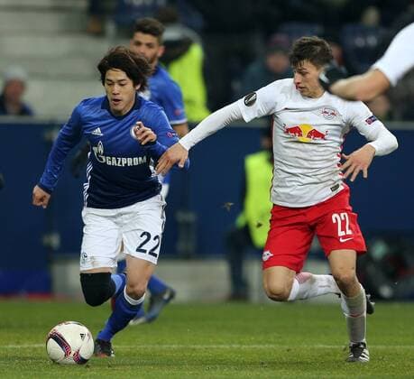 SOCCER - UEFA EL, RBS vs Schalke SALZBURG,AUSTRIA,08.DEC.16 - SOCCER - UEFA Europa League, group stage, Red Bull Salzburg vs FC Schalke 04. Image shows Atsuto Uchida (Schalke) and Stefan Lainer (RBS). GEPAxpictures xThomasxBachun