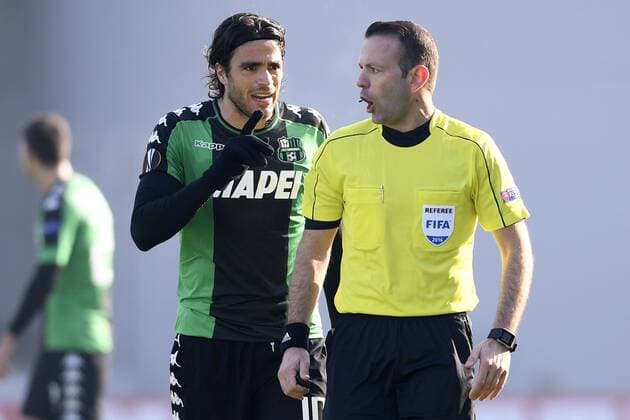Sassuolo s Alessandro Matri and Referee Orel Grinfeld pictured during a soccer game between Italian Club U.S. Sassuolo Calcio and Belgian team KRC Genk in Parma, Italy, Friday 09 December 2016, the sixth and last game of the group stage of the Europa League competition, in Group F. The match was scheduled for yesterday, but it was postponed due to heavy fog. YORICKxJANSENS  x04994458x