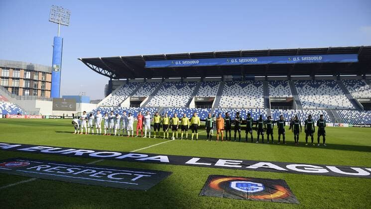 Genk s players and Sassuolo s players pictured before a soccer game between Italian Club U.S. Sassuolo Calcio and Belgian team KRC Genk in Parma, Italy, Friday 09 December 2016, the sixth and last game of the group stage of the Europa League competition, in Group F. The match was scheduled for yesterday, but it was postponed due to heavy fog. YORICKxJANSENS  x04994536x