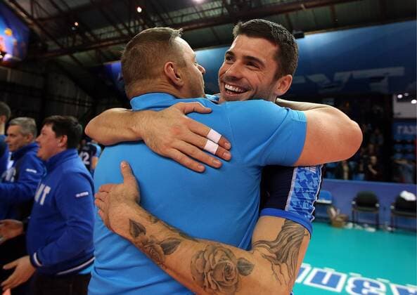 SURGUT, RUSSIA - DECEMBER 17, 2016: Zenit-Kazan s head coach Vladimir Alekno (L) and Matthew Anderson hug during an award ceremony for the 2016 Russia Volleyball Cup Final match against Lokomotiv Novosibirsk. Zenit-Kazan won the game 3-1. Roman Kruchinin TASS  TS03B811