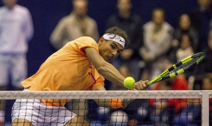 Spanish tennis player Rafa Nadal in action against Jordi Munoz and David Pere during Spain s Absolute Tennis Championship doubles final in Manacor, Balearic Islands, Spain, 17 December 2016. EFE Cati Caldera RAFA NADAL AND MARC LOPEZ PLAY THE DOUBLES FINAL AT SPAIN S ABSOLUTE TENNIS CHAMPIONSHIP IN MANACOR !ACHTUNG: NUR REDAKTIONELLE NUTZUNG!  BAL001 20161217-636176038820648059