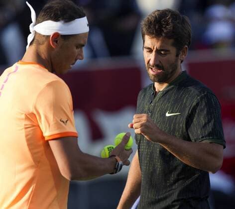 Spanish tennis players Rafa Nadal (L) and Marc Lopez in action against Jordi Munoz and David Pere during Spain s Absolute Tennis Championship doubles final in Manacor, Balearic Islands, Spain, 17 December 2016. Nadal and his teammate Marc Lopex became won the title. EFE Cati Caldera RAFA NADAL AND MARC LOPEZ PLAY THE DOUBLES FINAL AT SPAIN S ABSOLUTE TENNIS CHAMPIONSHIP IN MANACOR !ACHTUNG: NUR REDAKTIONELLE NUTZUNG!  BAL001 20161217-636176040749288422