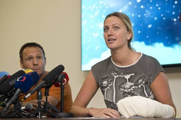 Czech twice Wimbledon winner Petra Kvitova (right), 26, said today she will do everything to return to playing after she underwent an operation on her playing left hand after an attack by an unknown man in her flat in Prostejov, south Moravia, on Tuesday. Kvitova was released from a specialist hospital in Vysoke nad Jizerou, north Bohemia, today. She said I am feeling well in Prague, Czech Republic, December 23, 2016. At left is fitness coach David Vydra. (CTKxPhoto MichalxKamaryt) CTKPhotoF201612260810701  kmt archiv