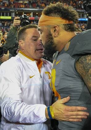 December 30, 2016: Head Coach Butch Jones hugs Derek Barnett 9 after the game for passing Reggie White s all time sack record in the game between the Nebraska Cornhuskers and the Tennessee Volunteers in the Franklin American Mortgage Music City Bowl at Nissan Stadium in Nashville, TN. Thomas McEwen CSM NCAA College League USA Football 2016: Franklin American Mortgage Music City Bowl Nebraska vs Tennessee DEC 30 - ZUMAc04_ 20161230_zaf_c04_116